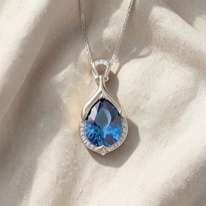 Sapphire Blue Teardrop Embrace Pendant Necklace